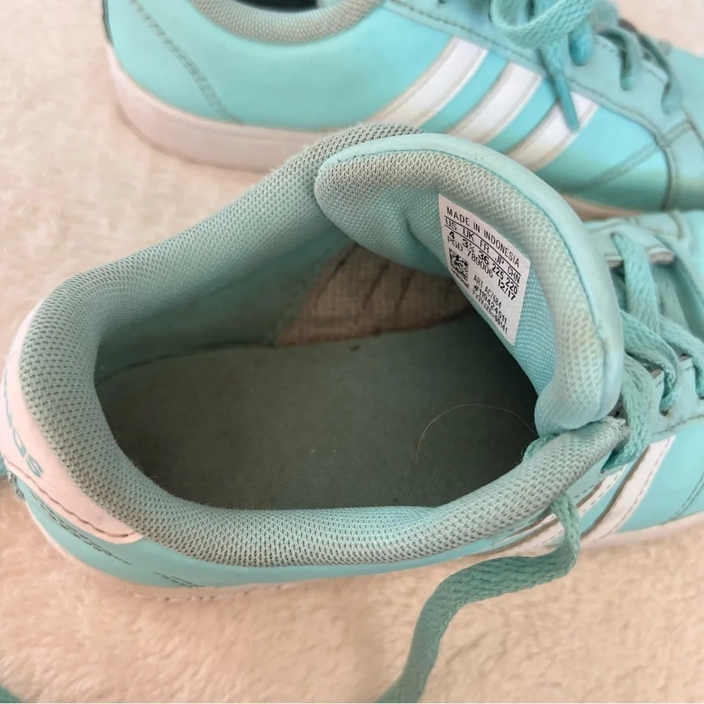 Adidas teal blue kids sneakers with white stripes, size 4, preowned